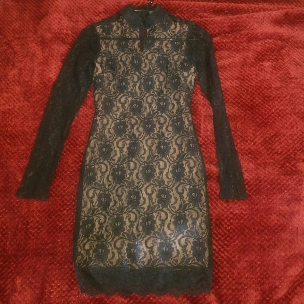 Lace dress with nude lining